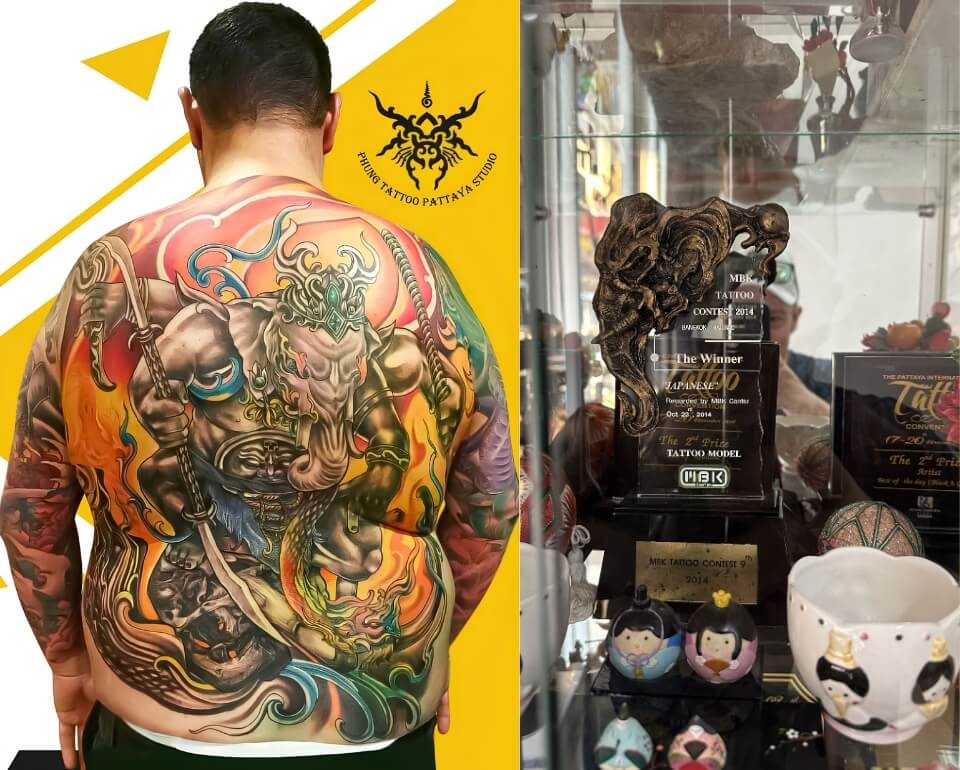 Thai Stil Rücken Tattoo und Auszeichnungen von K. Note Großflächiges farbiges Rücken Tattoo im Thai Stil neben den Auszeichnungen von K. Note im Phung Tattoo Studio in Pattaya